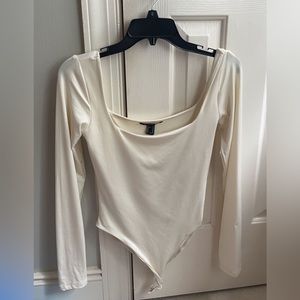 Forever 21 long sleeve cream bodysuit
